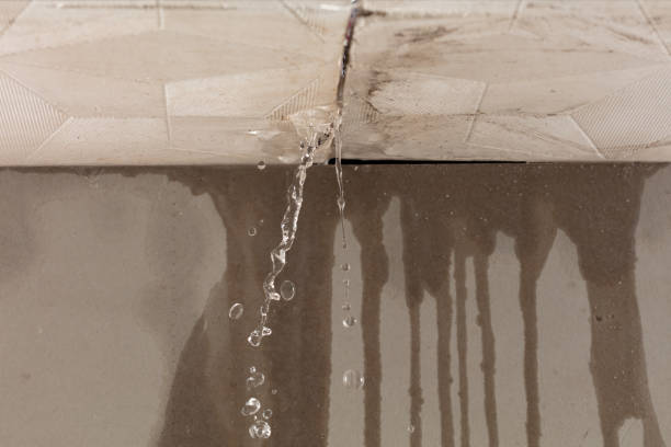 Professional Flood Damage Cleanup technician working in Orange, MA